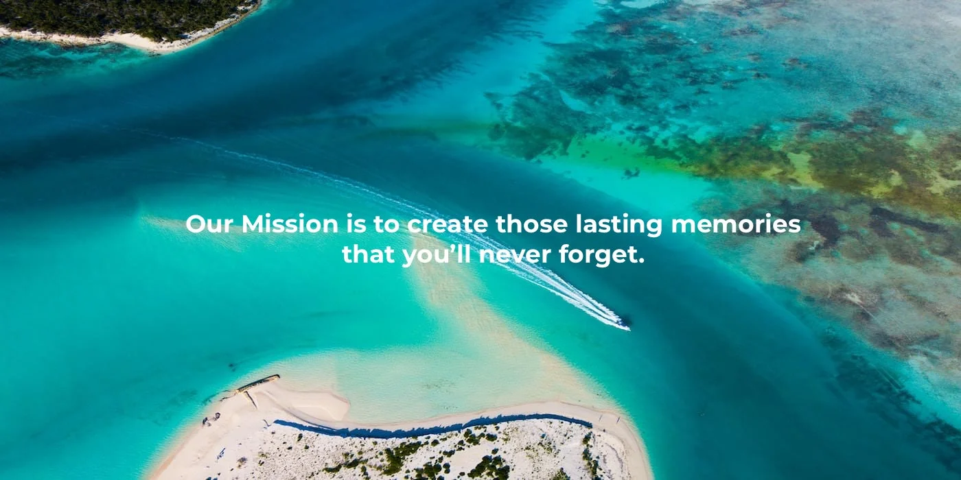 Aerial Boat Tour Over Turks and Caicos | Caicos Water Fun Aerial drone photo of a white boat leaving a wake through turquoise waters between sandy islands on a Caicos Water Fun tour in Turks and Caicos.